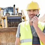 construction worker with walkie talkie